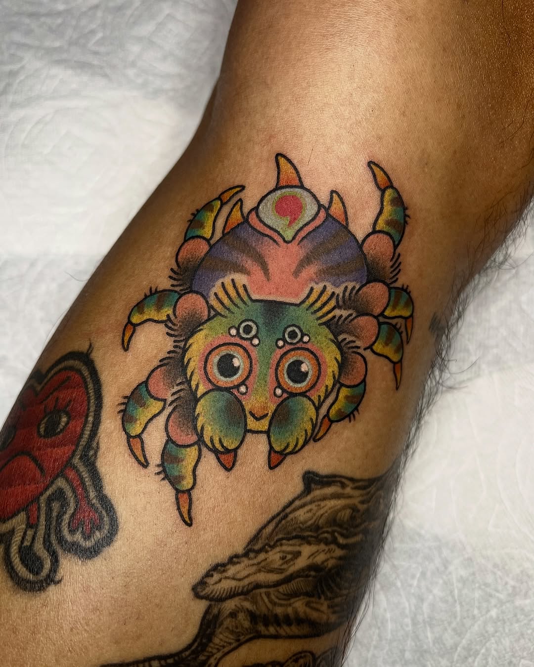 Bright neon-crab cartoon tattoo with bold outlines