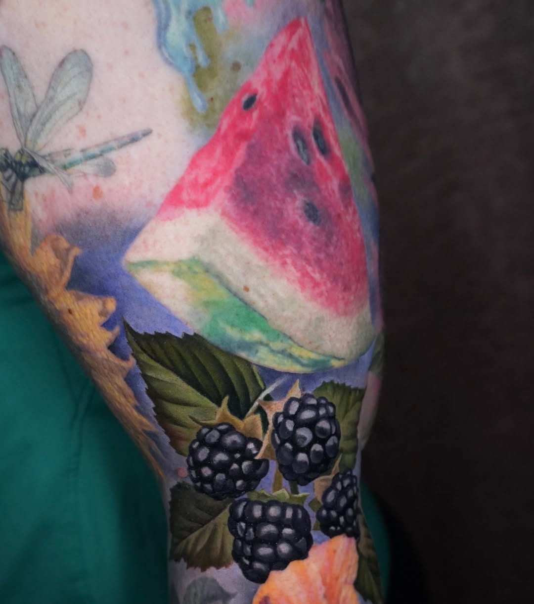 Vivid fruit collage with watermelon slice and blackberries