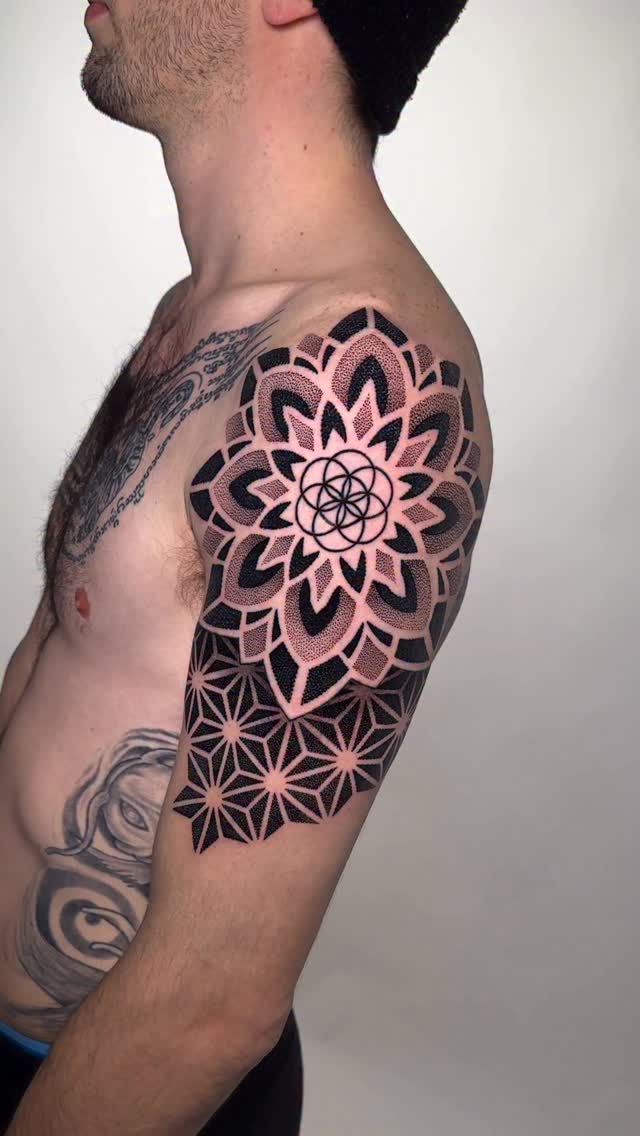 Bold geometric mandala sleeve with pink dot shading