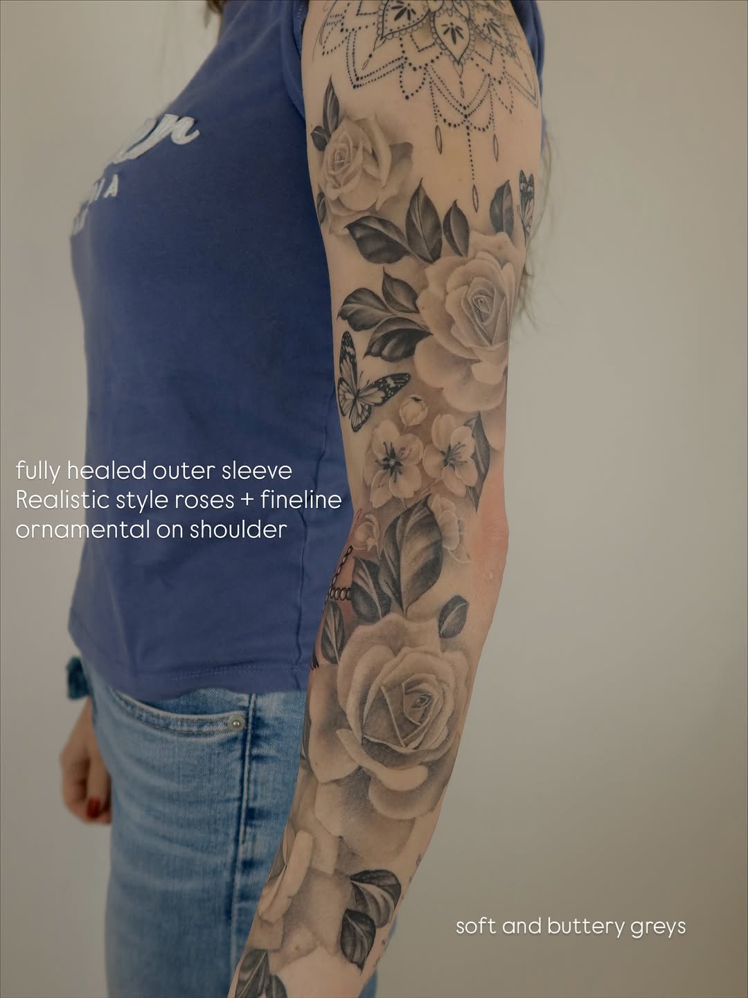 Hyper-realistic grayscale rose sleeve with fine-line florals