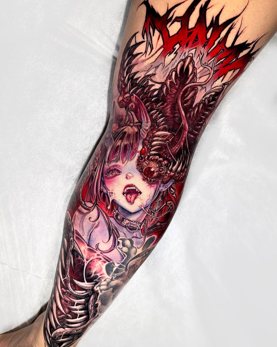 Vivid horror-leg sleeve featuring demonic winged creature and siren girl