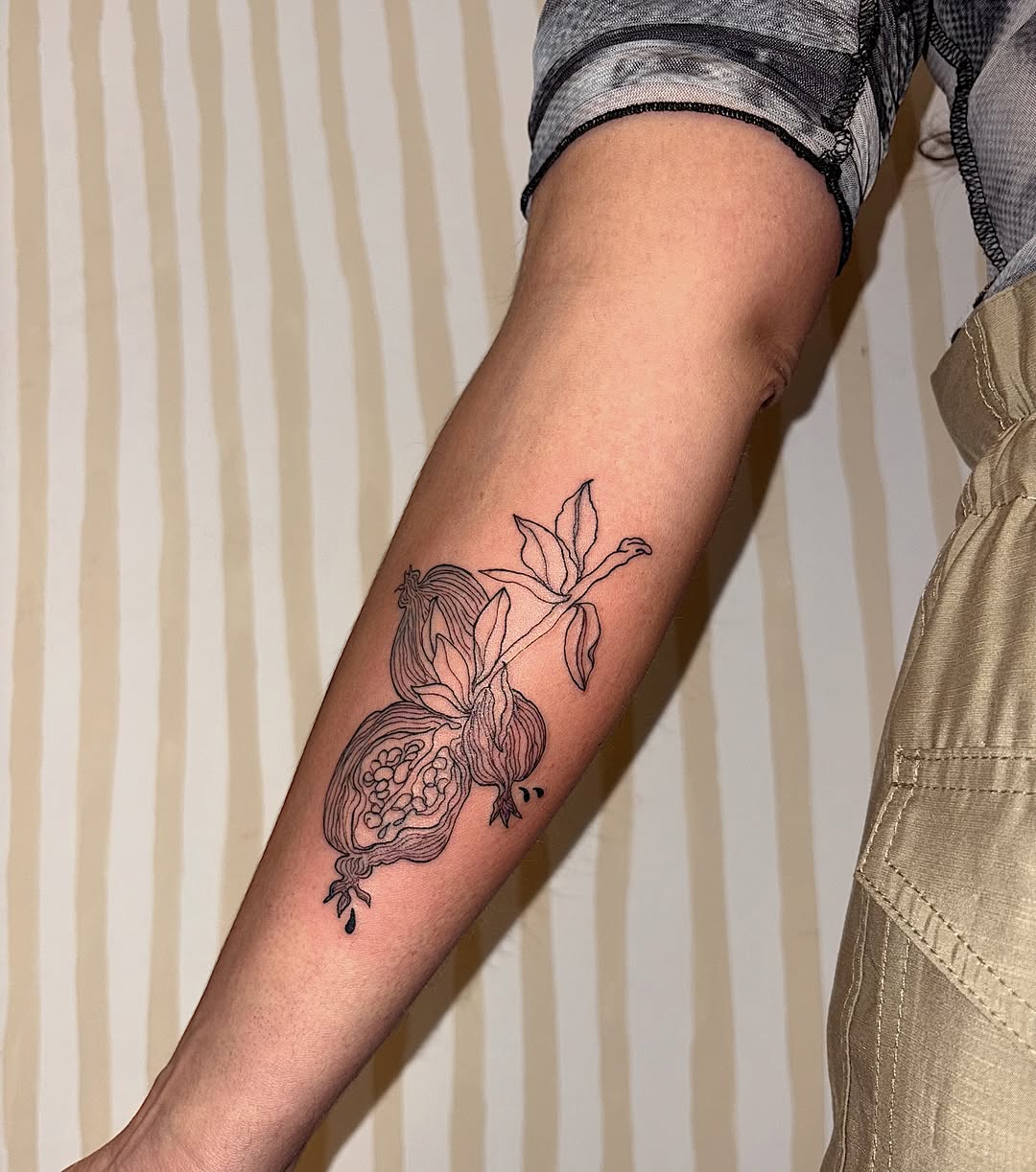 Floral tattoo on forearm