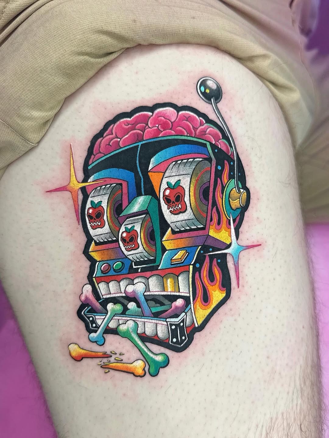 Bold neon brain-machine with skull reels and flames