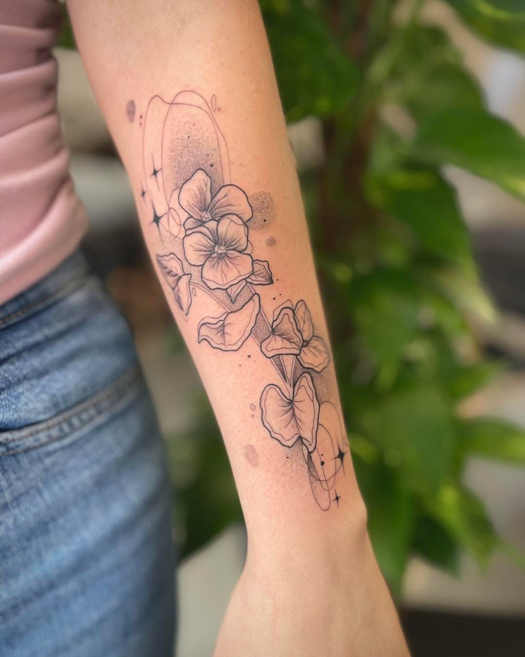 Delicate fine-line violet bouquet with airy botanicals.