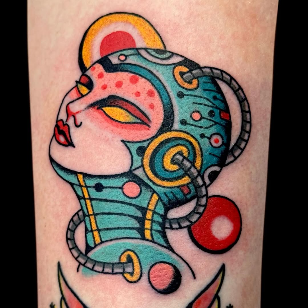 Vivid neo-traditional cyborg head with bold circuitry