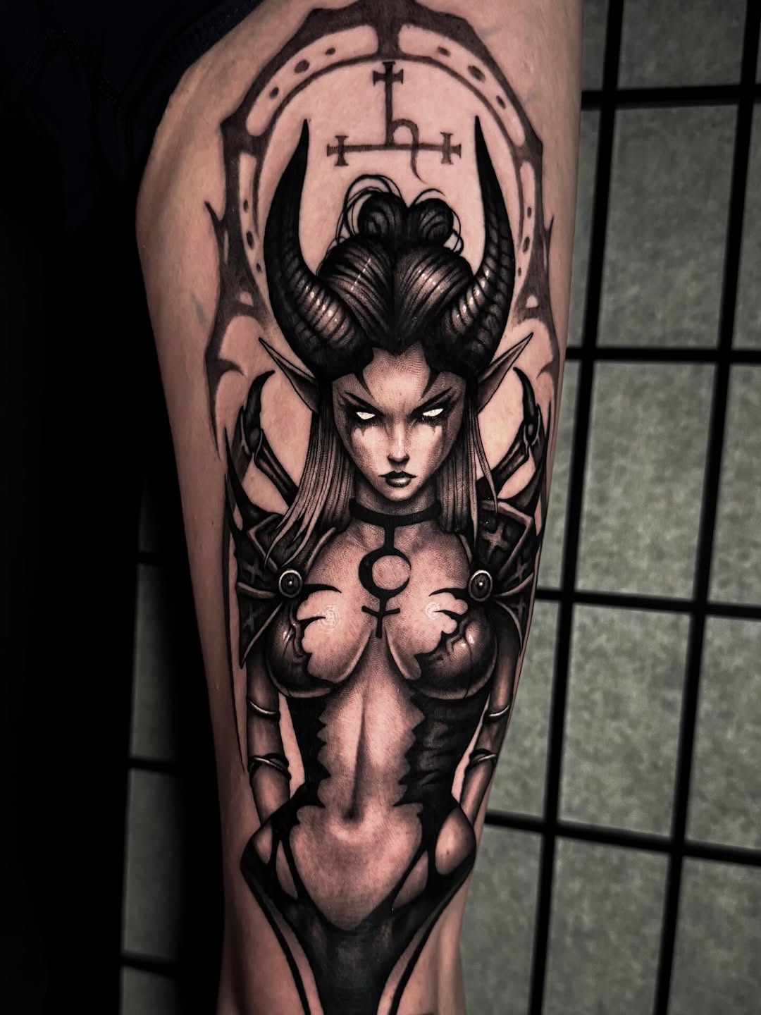 Lilith-inspired demoness with horns, sultry gaze, monochrome shading