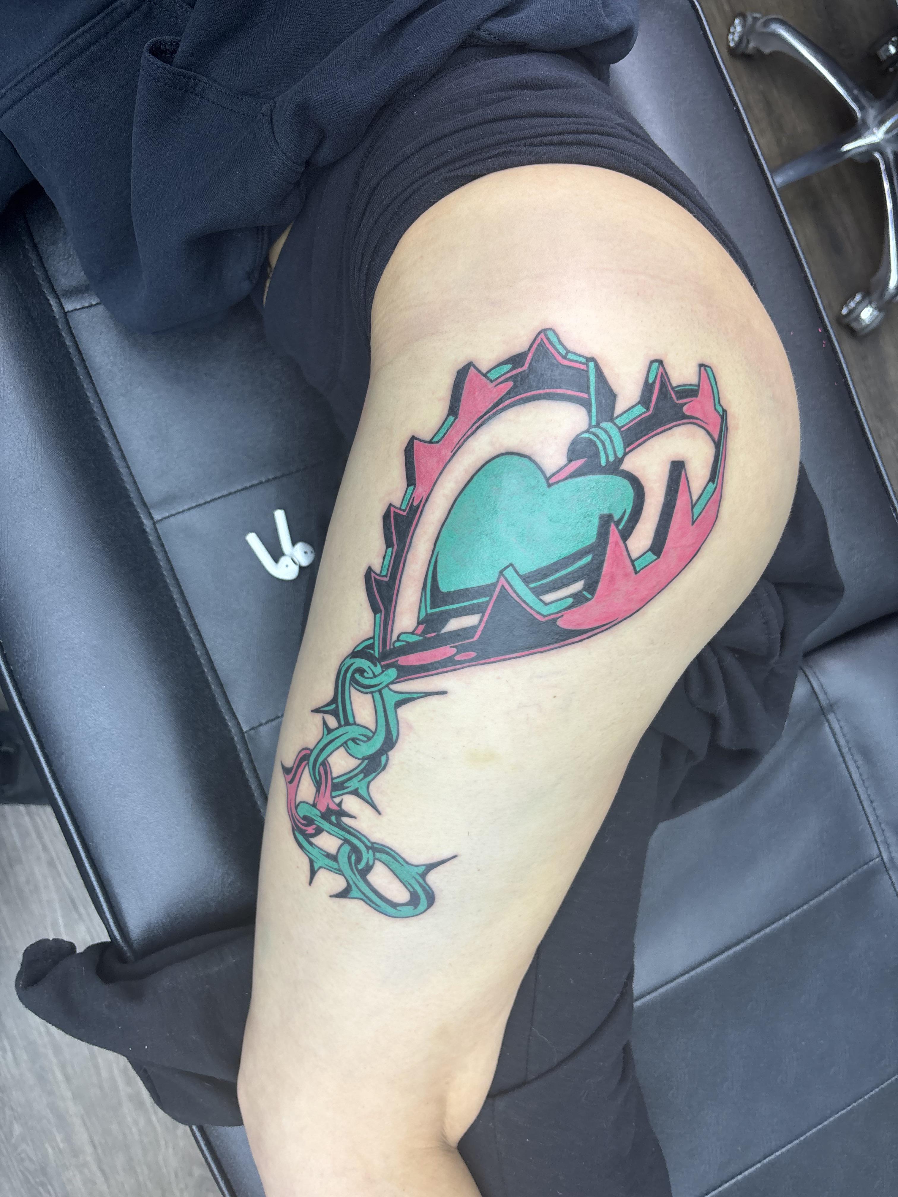 Vibrant neo-traditional broken-heart trapped in jagged frame