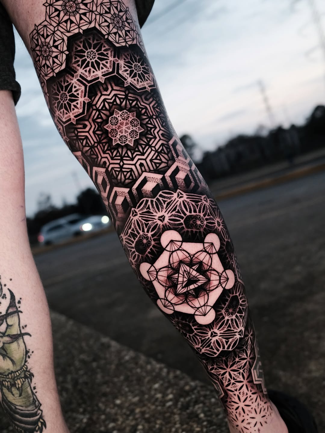 Metatron's Cube sacred geometry leg tattoo with tessellations