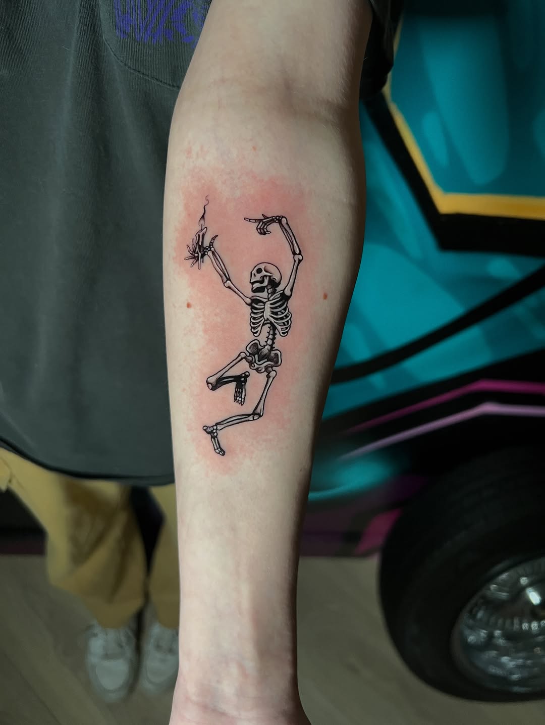 Playful skeletal dancer with clean black linework