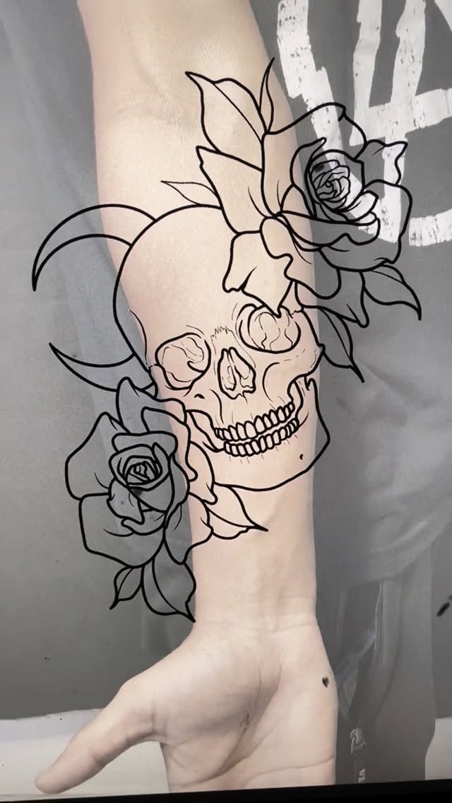 Macabre skull entwined with blooming roses in bold linework