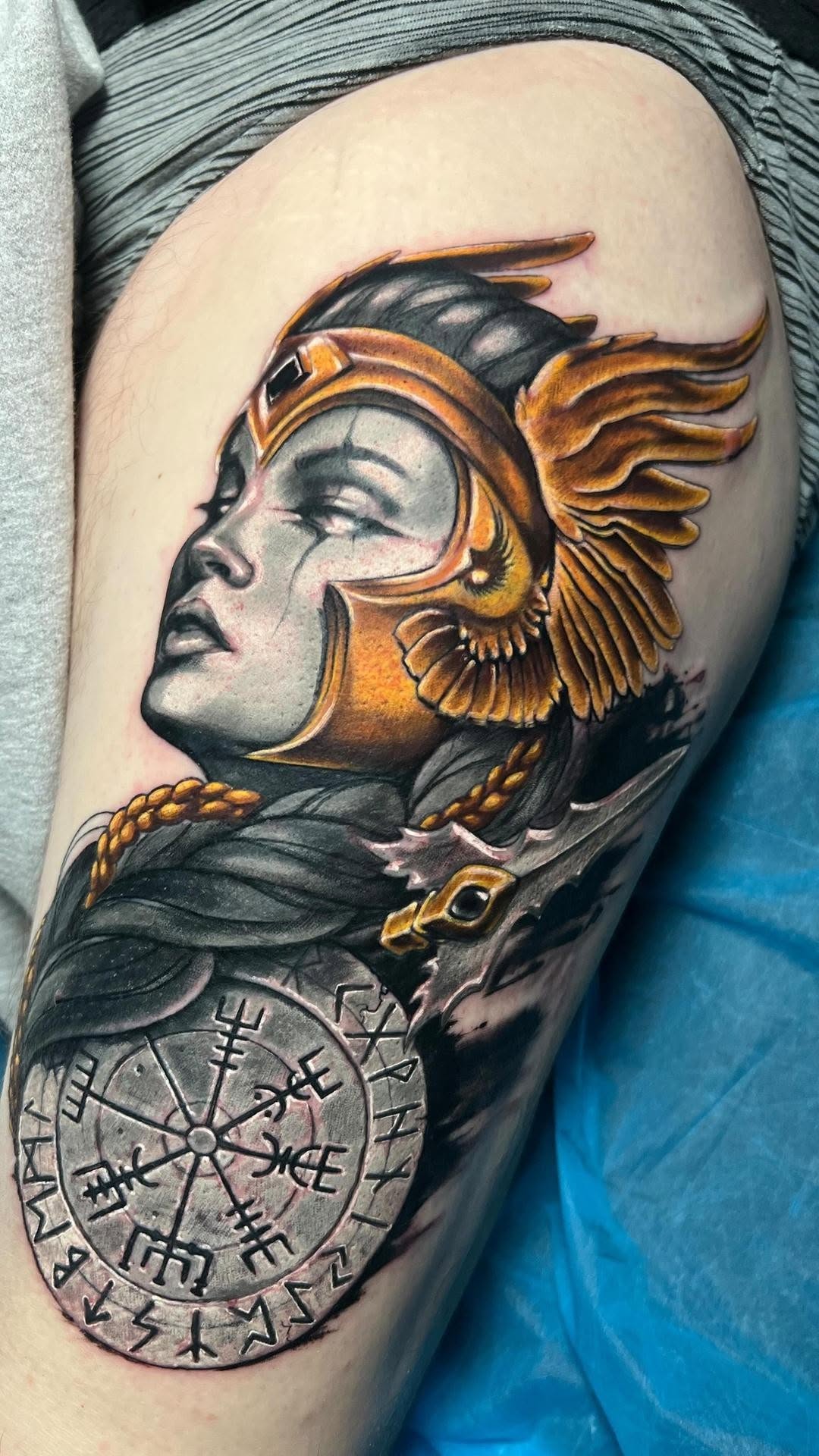 Valkyrie portrait with winged helm and rune shield