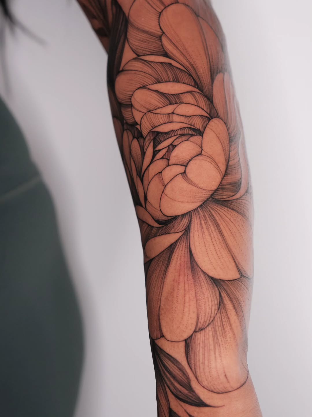 Floral peony tattoo design