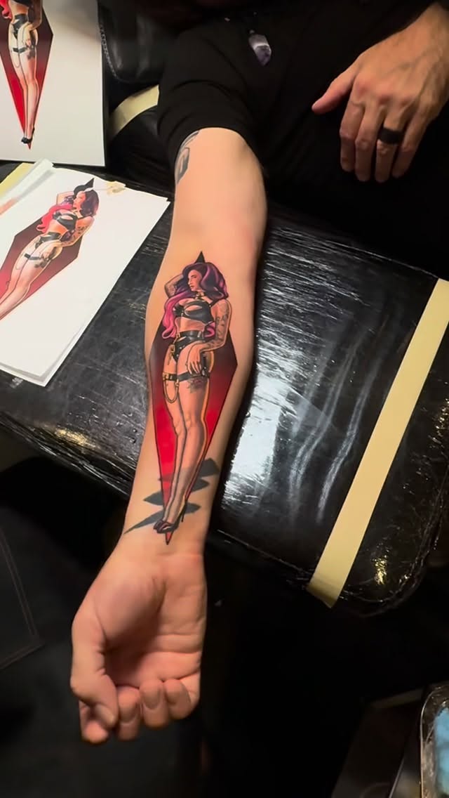 Bold Nikko-traditional pinup girl on forearm
