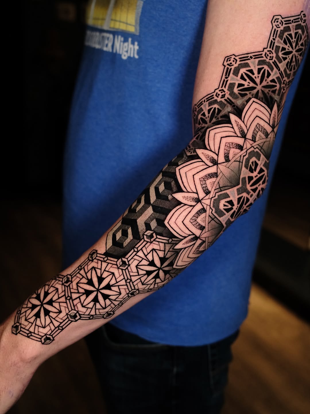 Intricate geometric sleeve with interlocking patterns and mandala florals