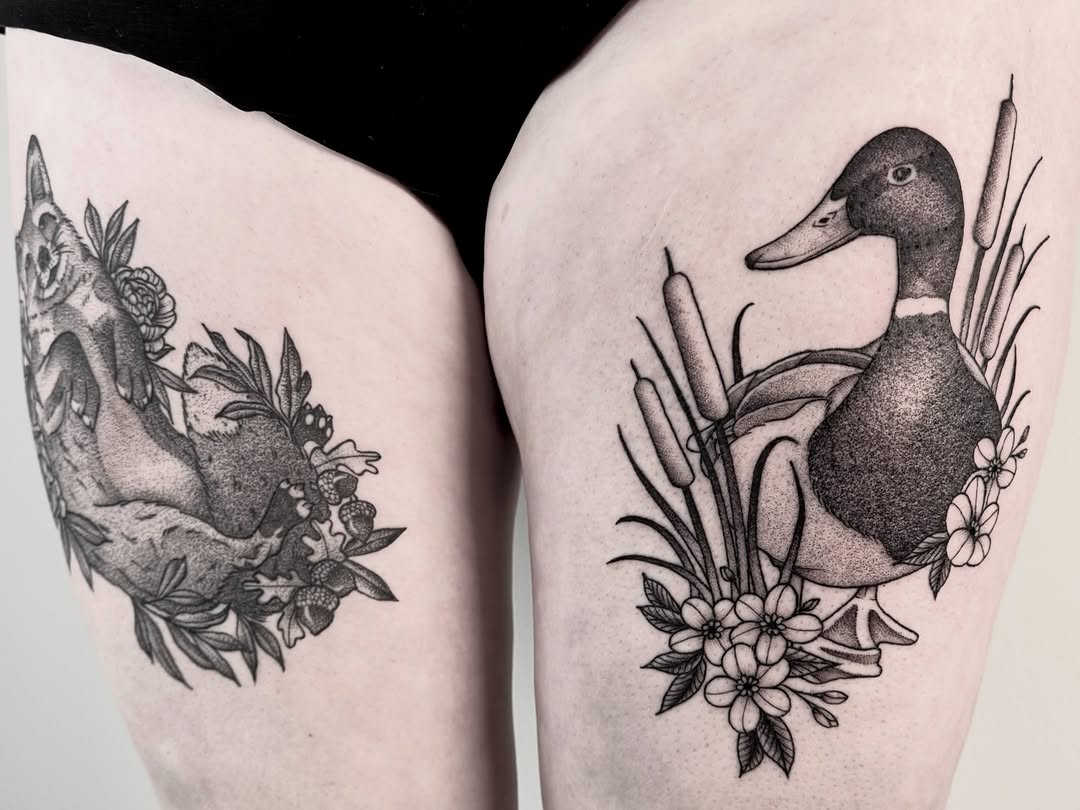 Twin thigh pieces: fox and mallard among cattails