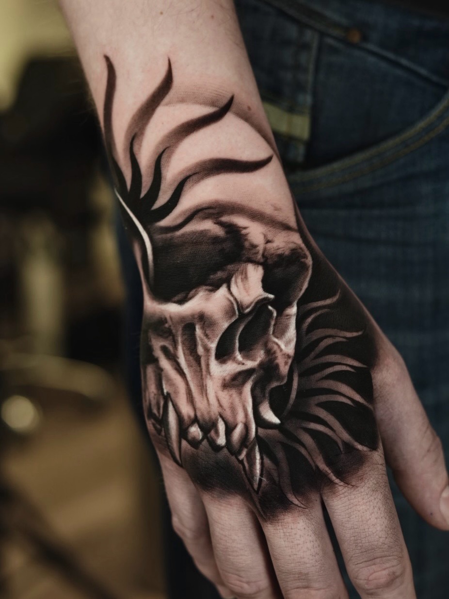 Black and gray skull tattoo