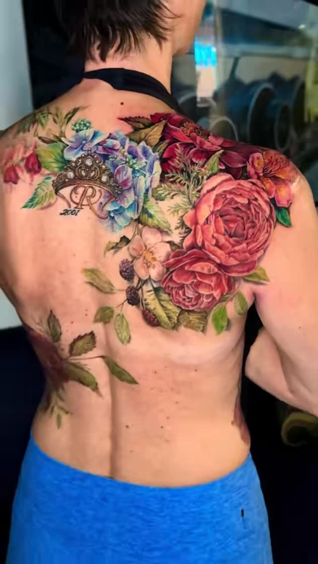 Vibrant painterly floral back piece with roses and greenery