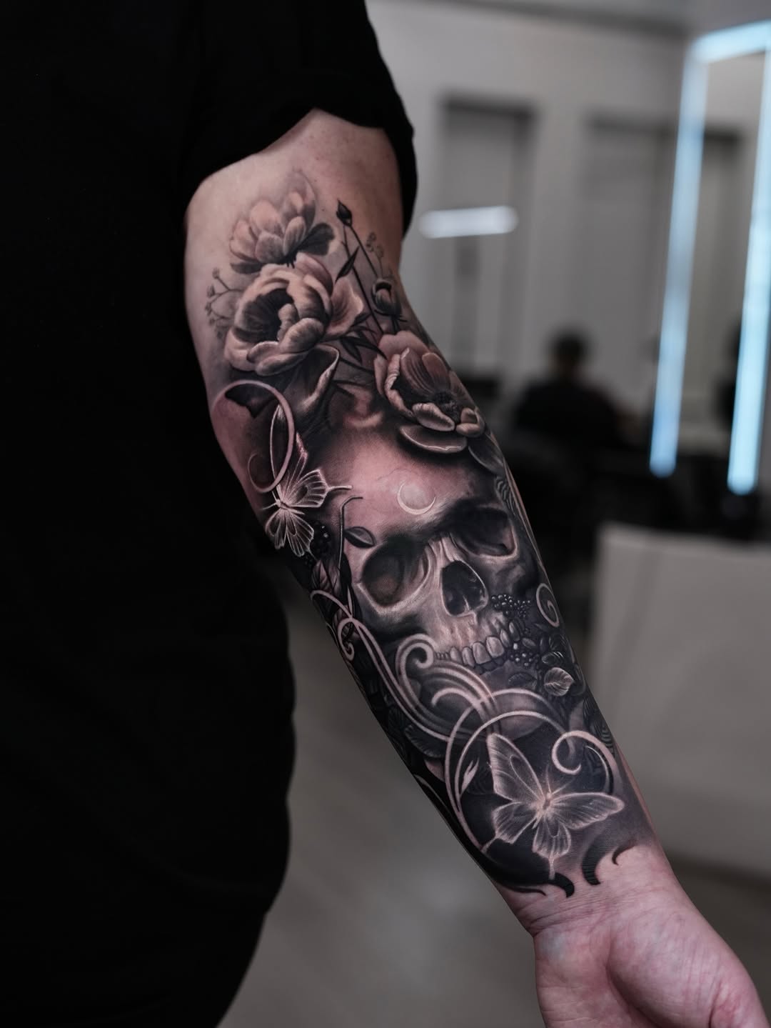 Black and gray rose skull tattoo