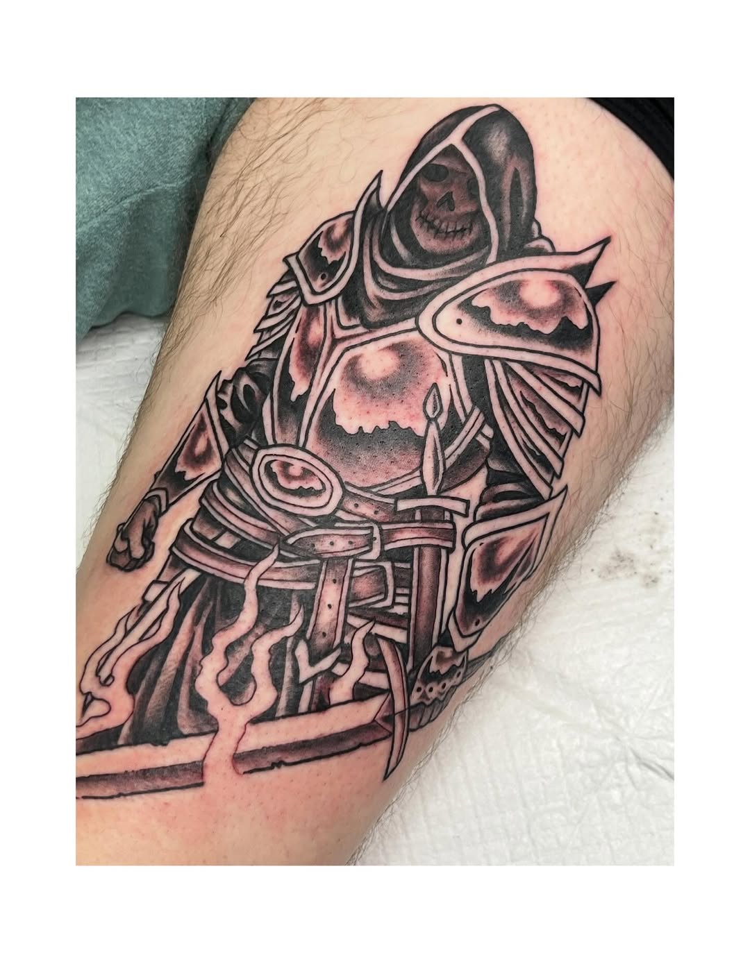 Bold blackwork hooded knight in heavy armor