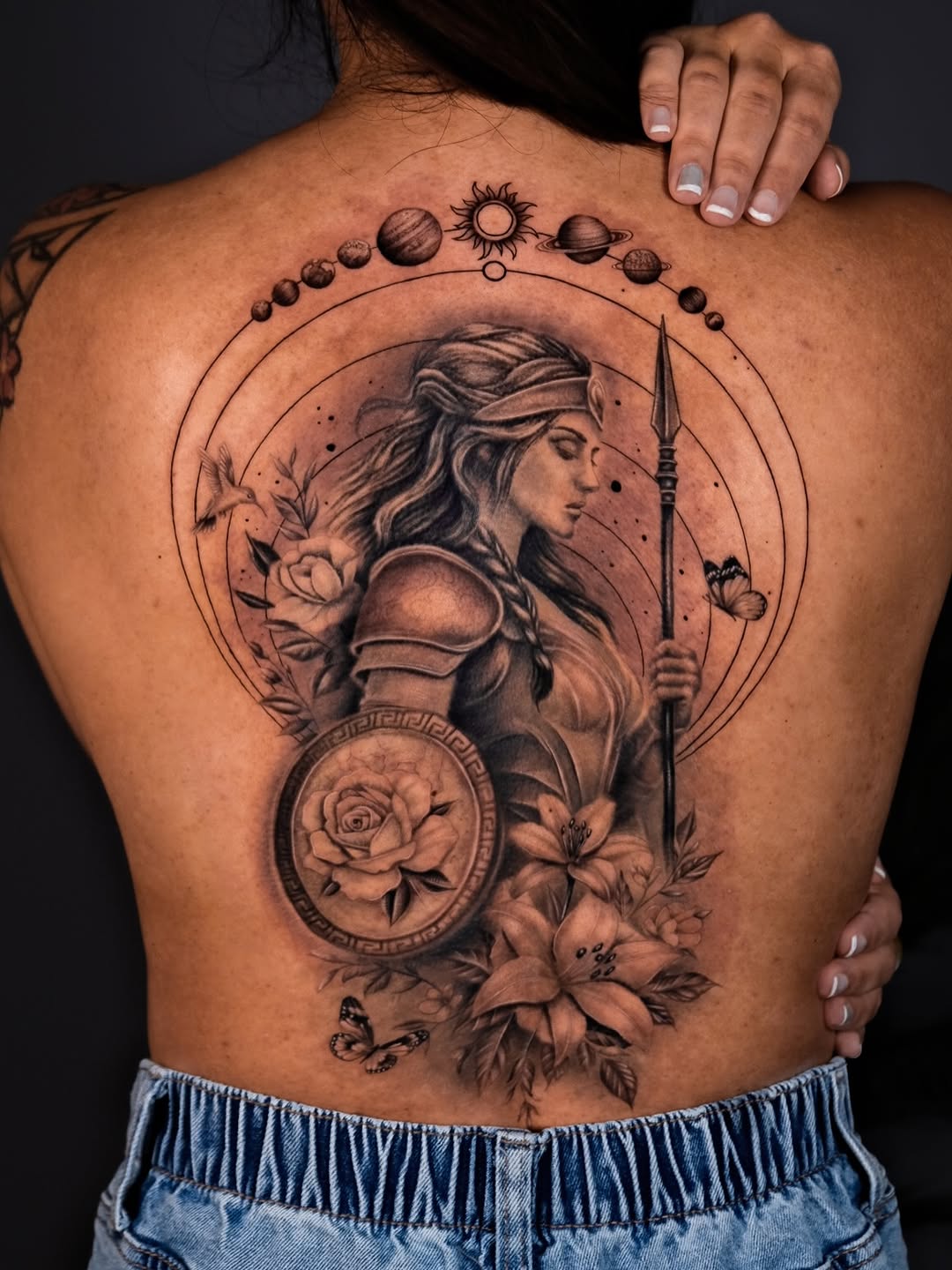 Stunning black-and-gray Valkyrie with celestial rings and florals.