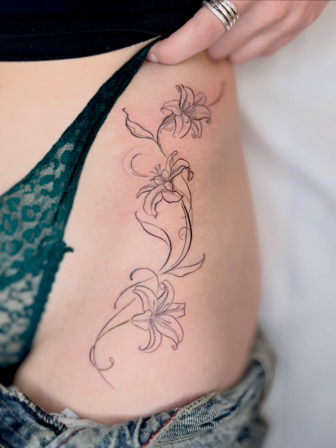 Elegant freehand lily vine with delicate linework