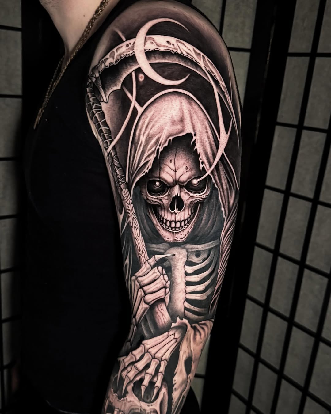 Monochrome grim reaper skeleton sleeve with bold shading