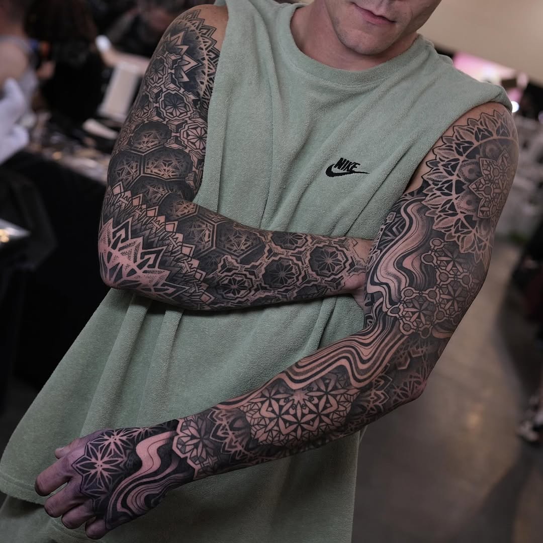 Intricate geometric ornamental sleeve with mandala-inspired motifs