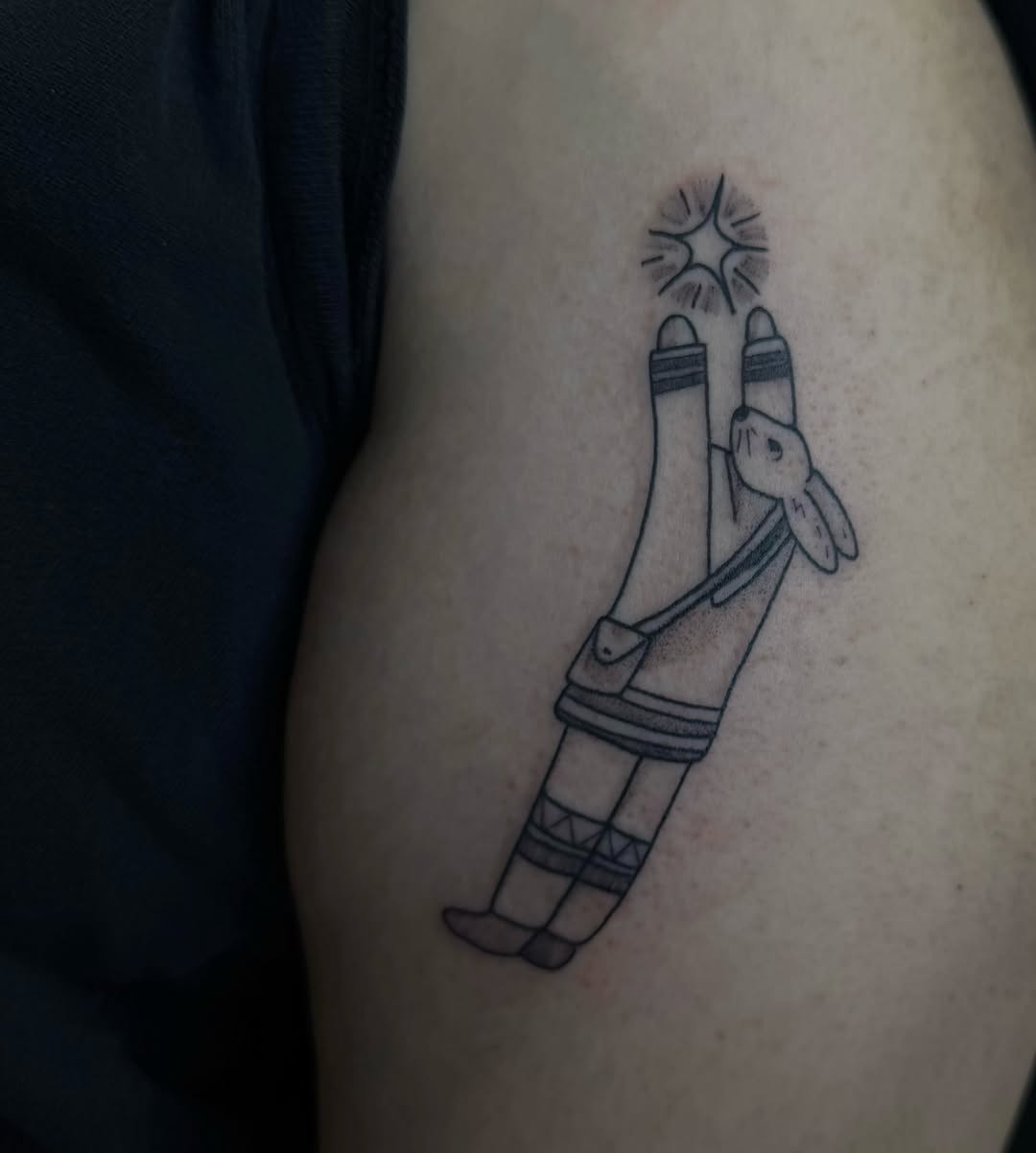 Whimsical cartoon socks with a bunny charm, bold lines