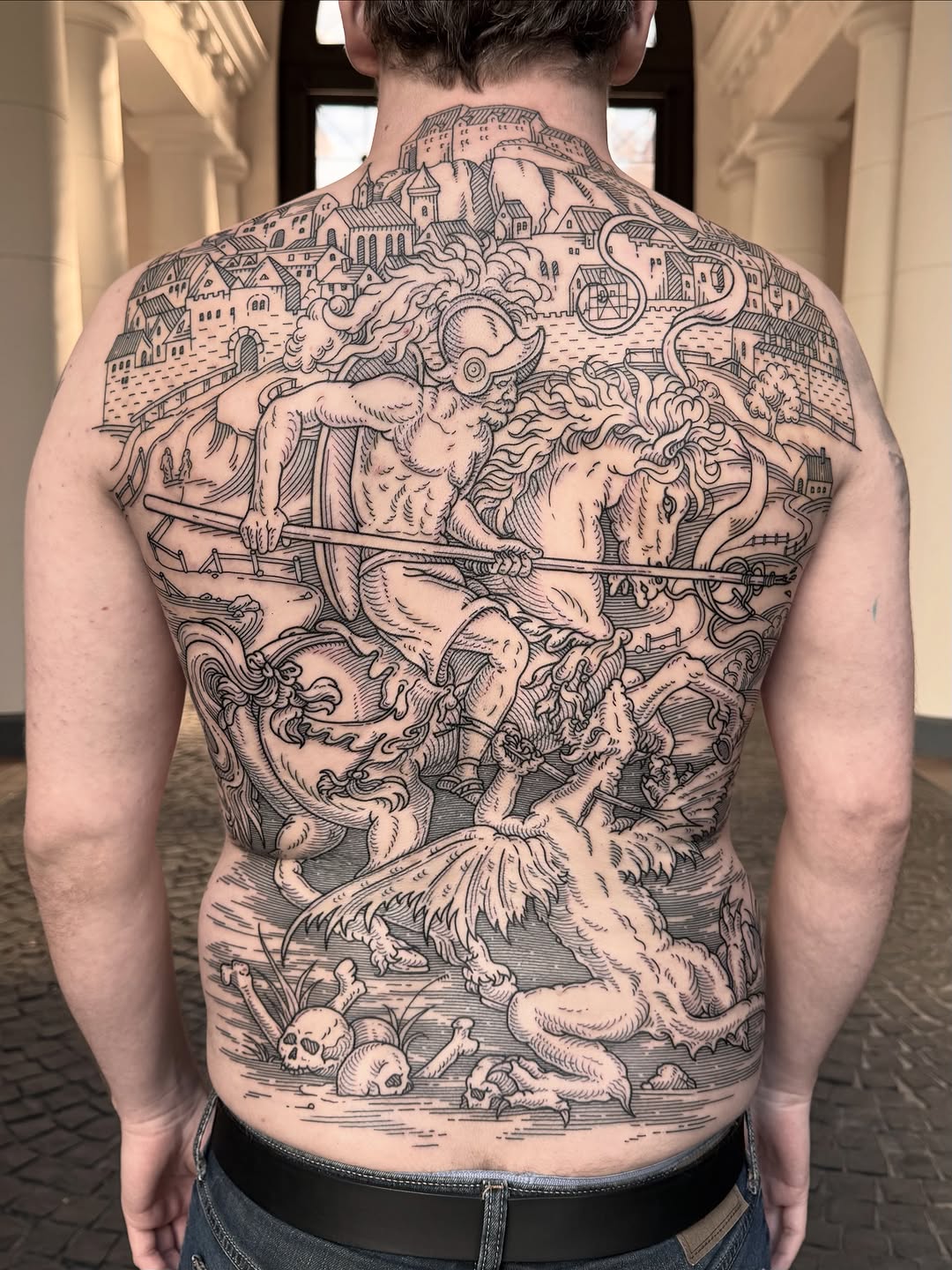 Epic woodcut-inspired back piece with mythic battle scene