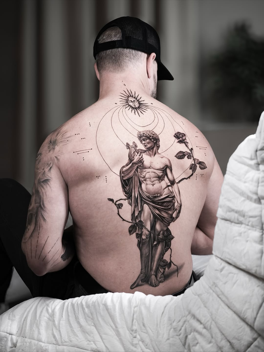 Apollo back piece tattoo