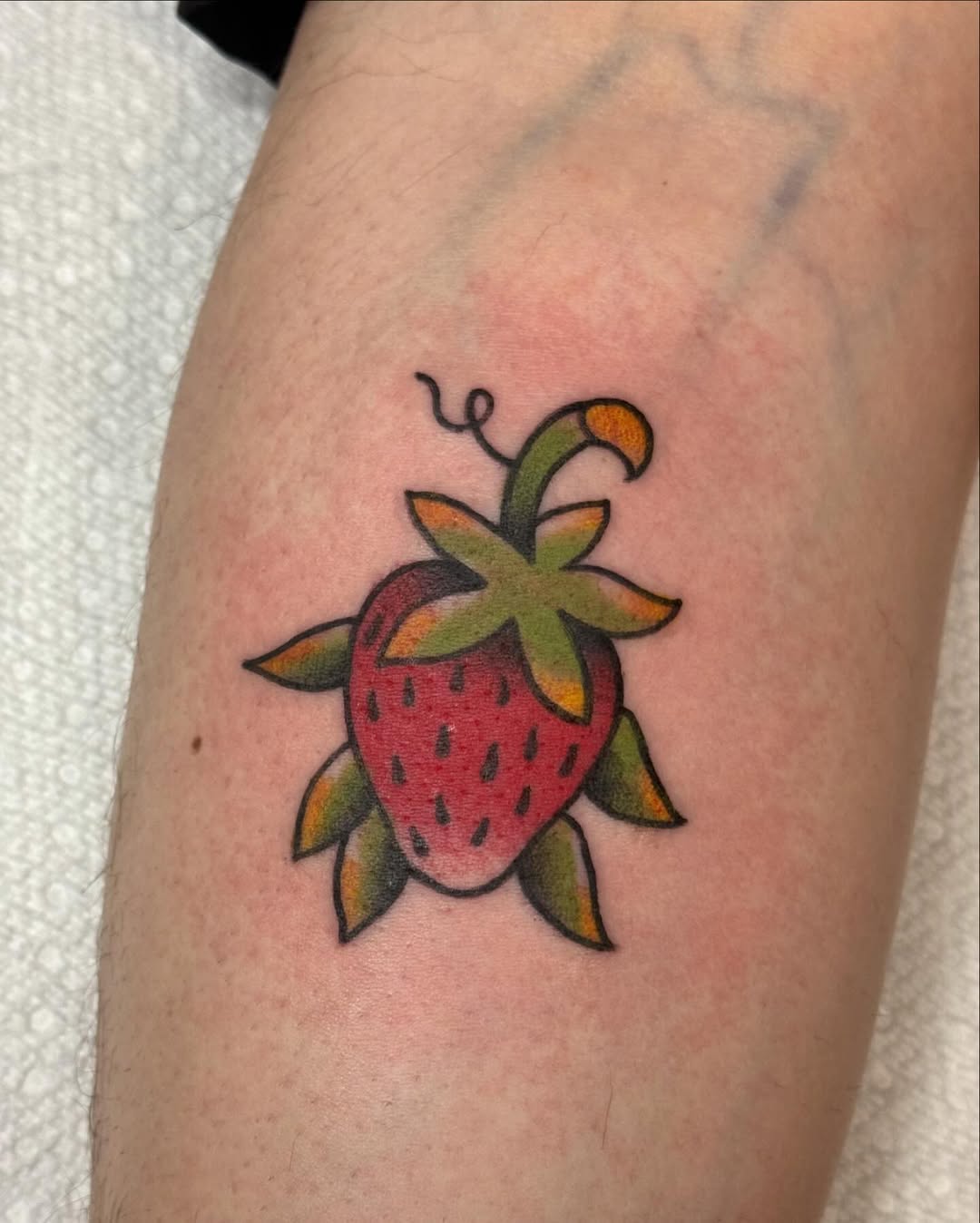 Vibrant cartoon strawberry with bold black outlines.