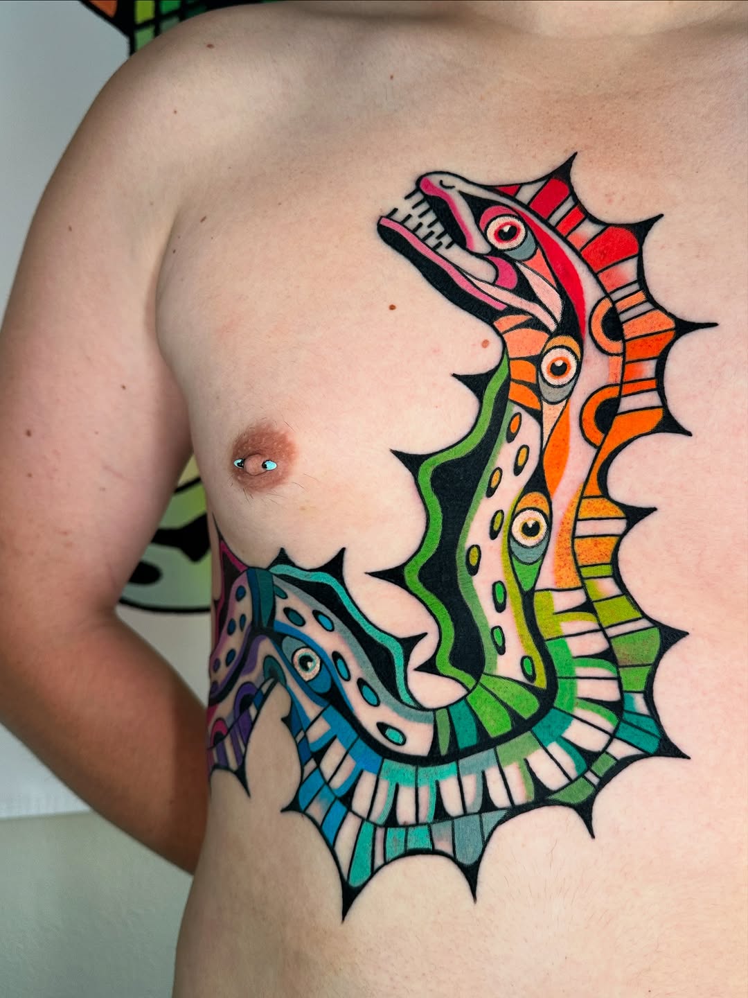 Vibrant seahorse-like creature with color-blocked stripes