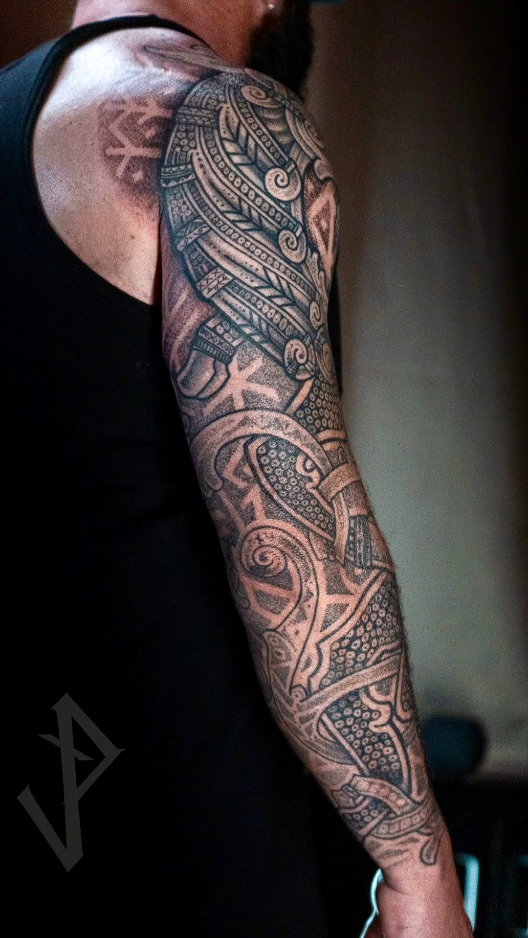 Intricate blackwork sleeve with interlaced Nordic-inspired patterns