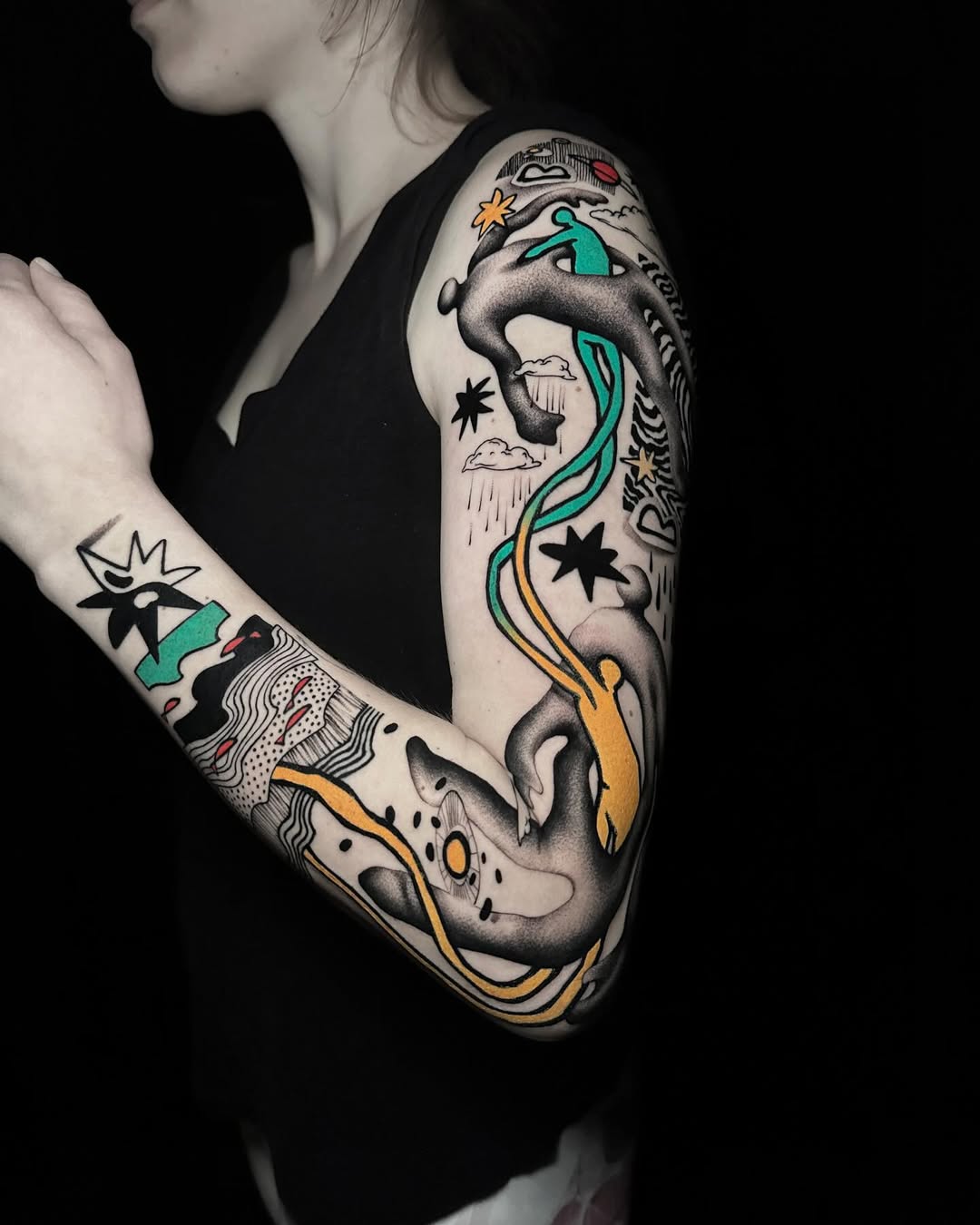 Bold graphic surreal sleeve with teal and gold accents.
