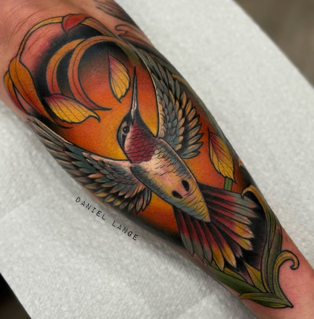Colorful hummingbird tattoo