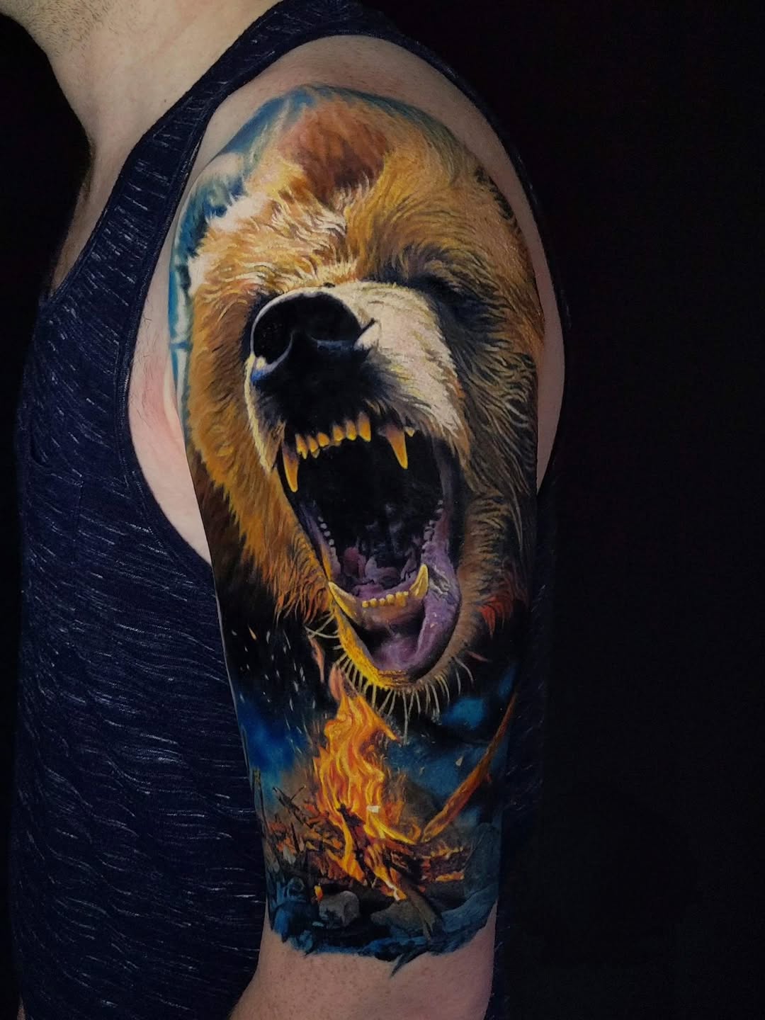 Ferocious roaring bear head with fiery, smoky background.
