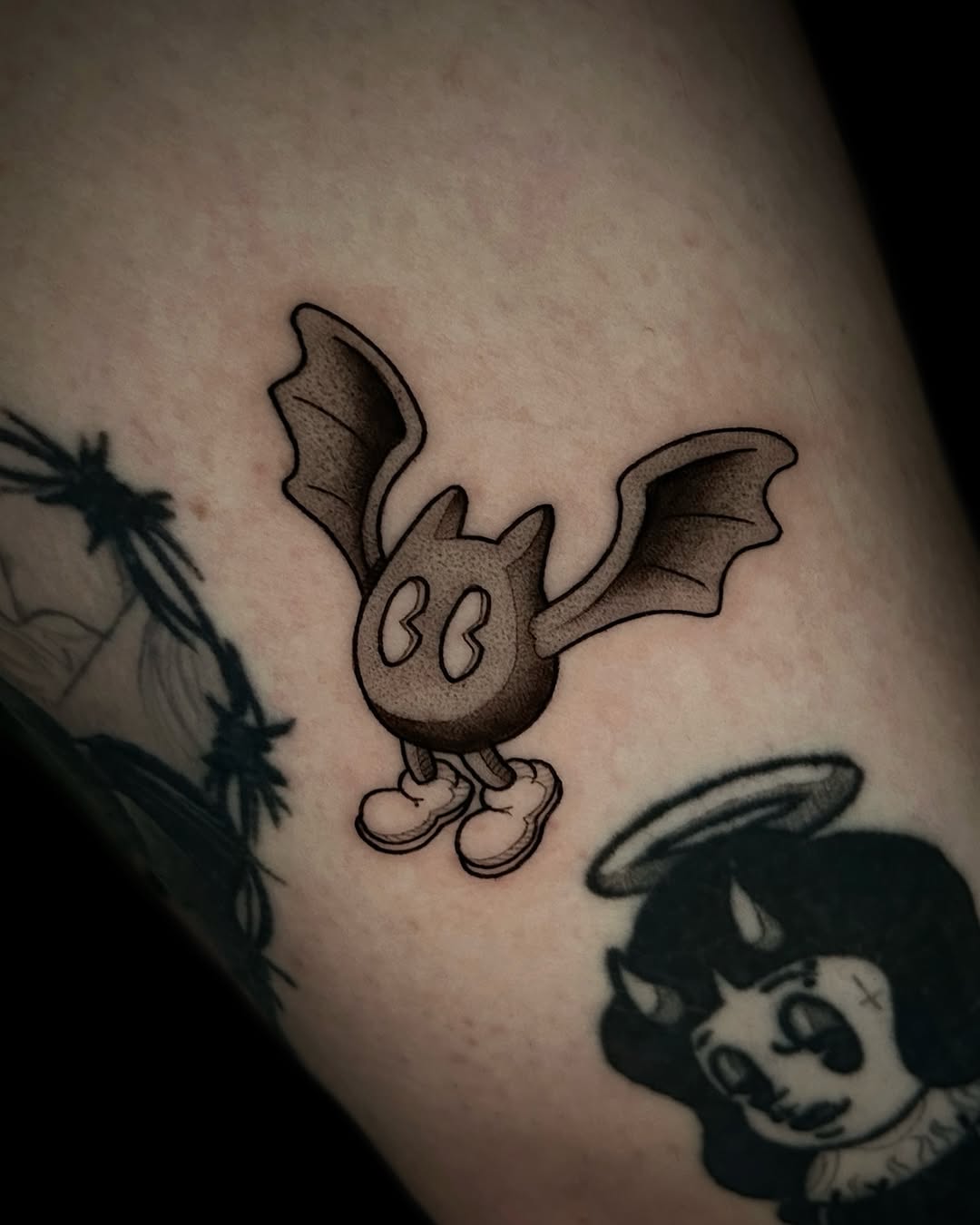 Whimsical rubberhose bat with big wings and sneakers