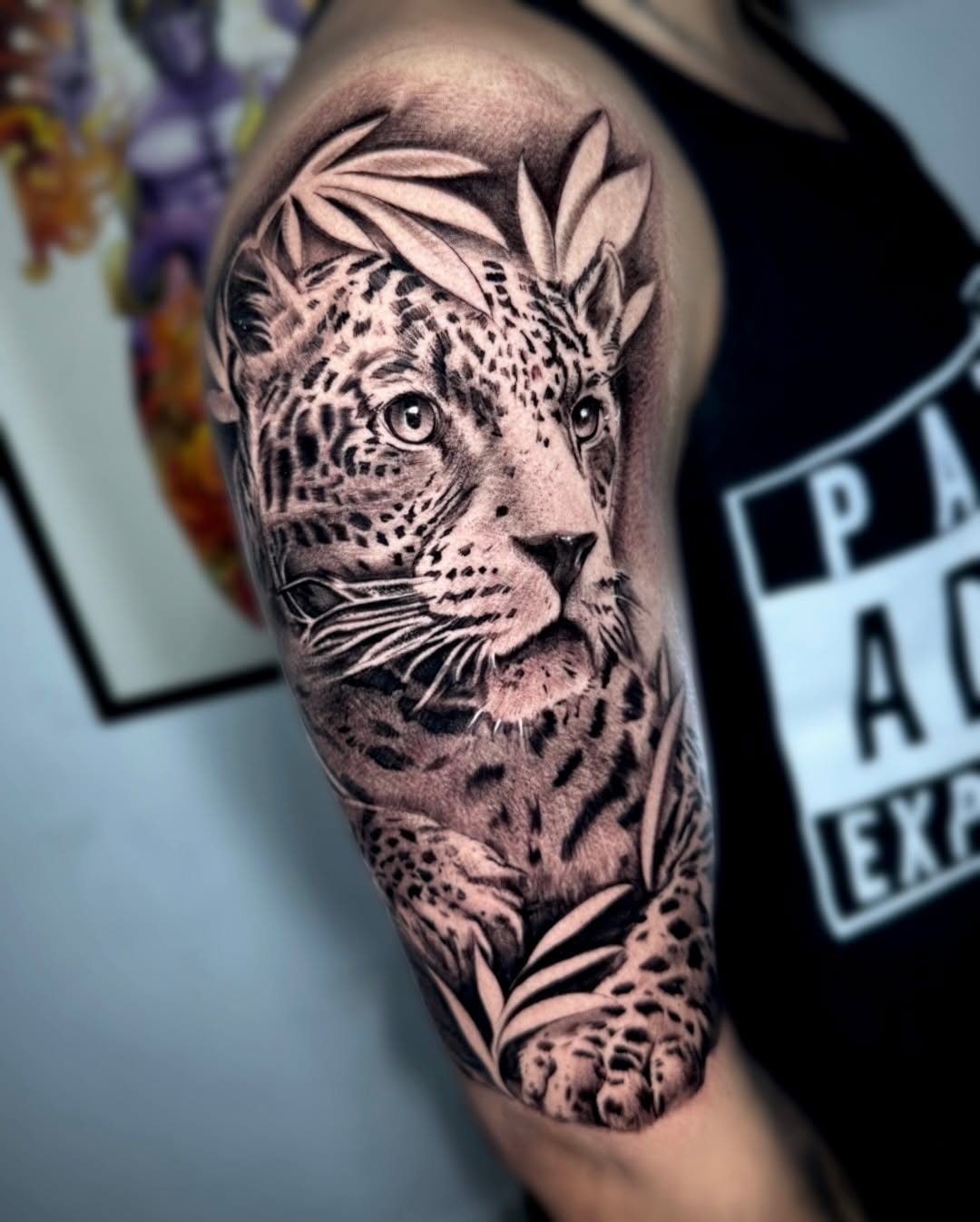 Hyper-detailed black-and-gray leopard portrait with leafy accents