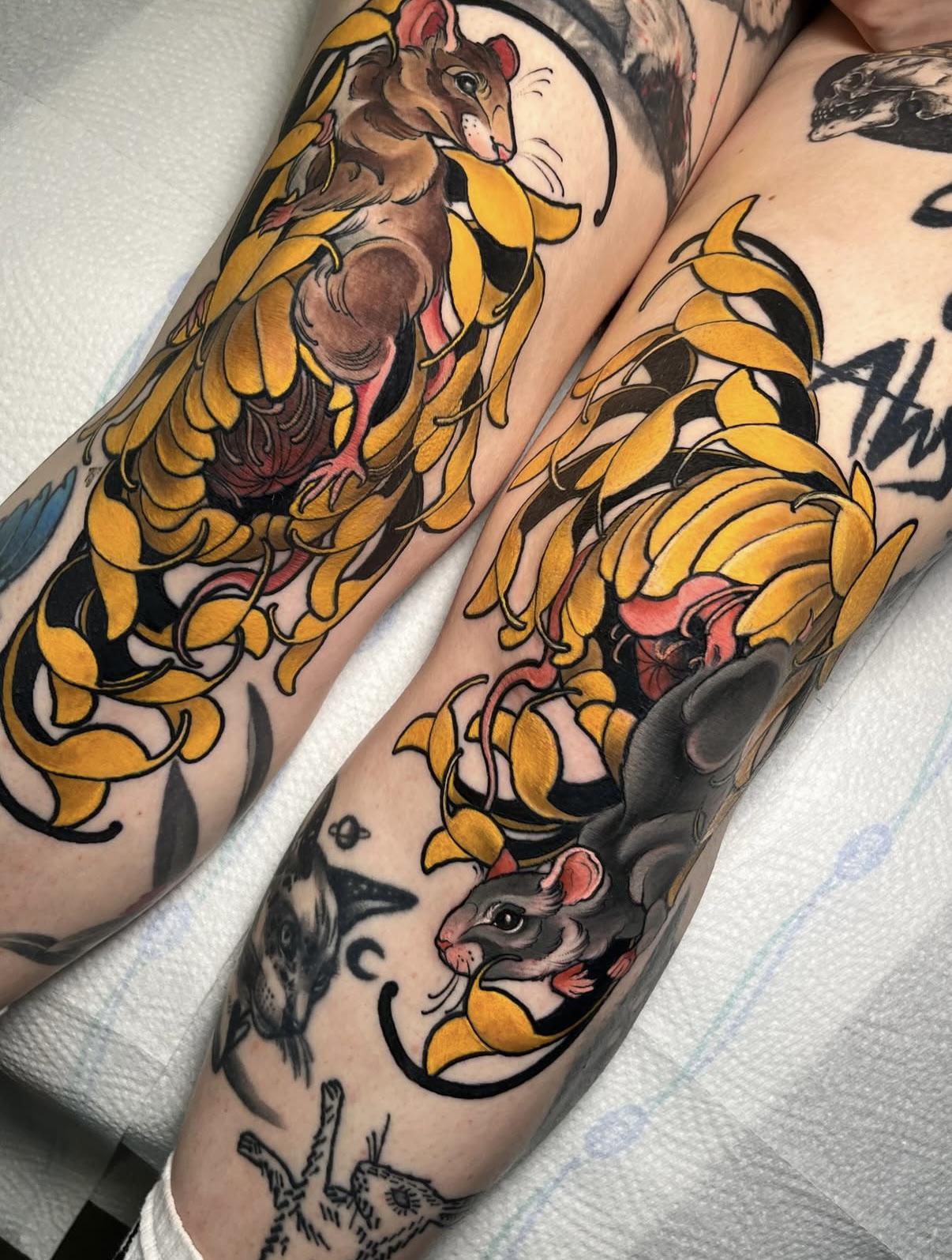 Bold neo-traditional rat wrapped in vivid yellow floral vines