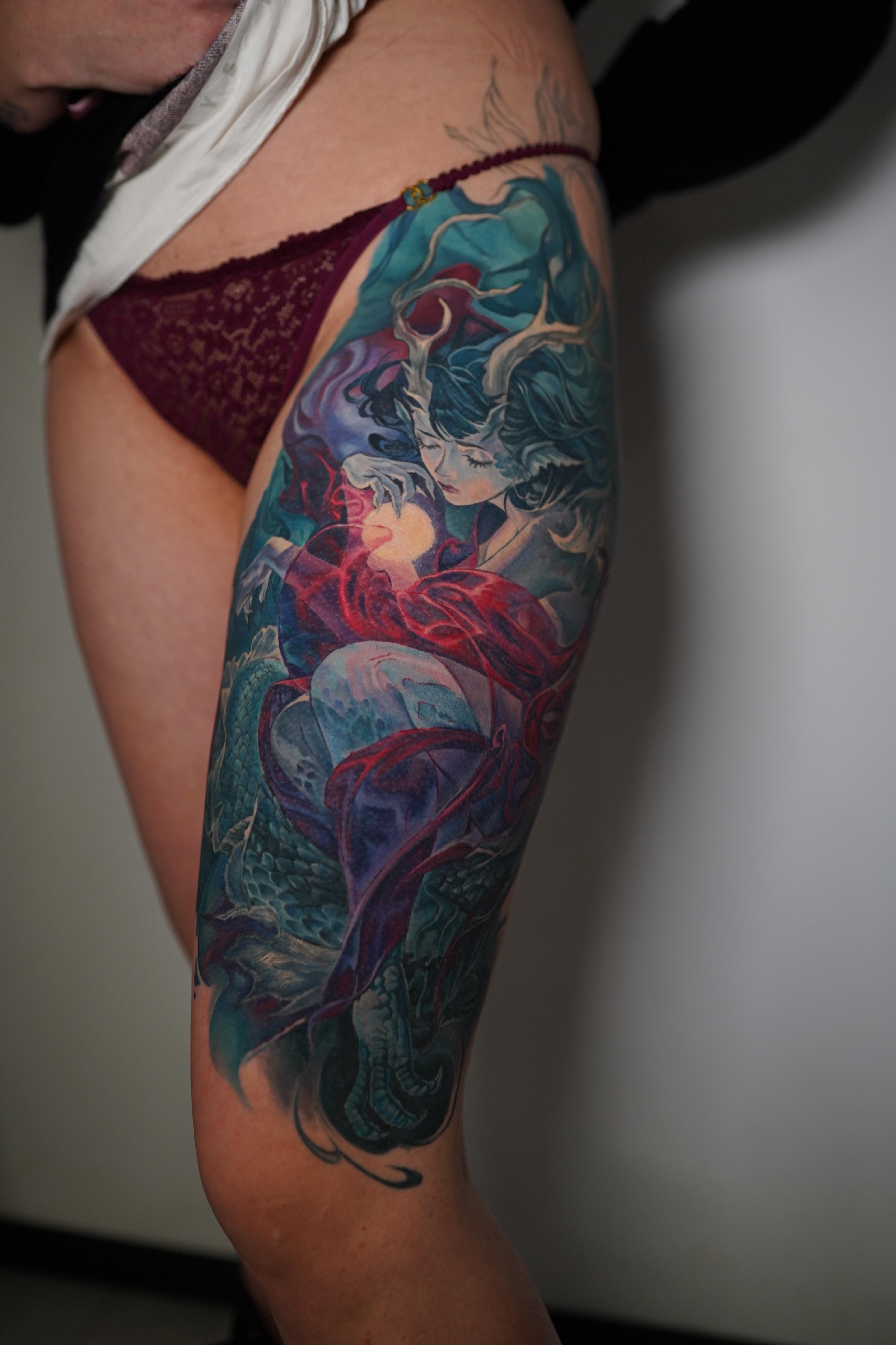 Vibrant color-realism leg sleeve with woman and dragon
