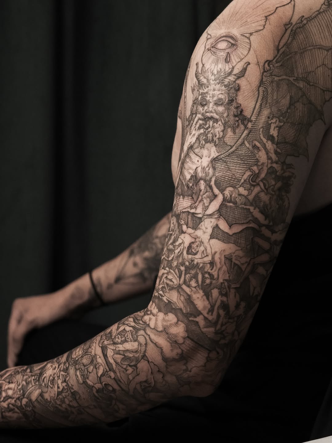 Intricate blackwork sleeve, Dante's circles etched in detail