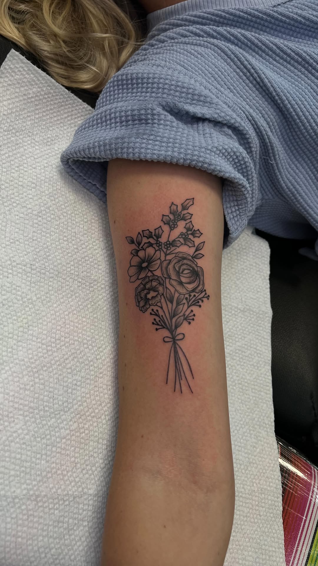 Delicate black floral bouquet with tied ribbon