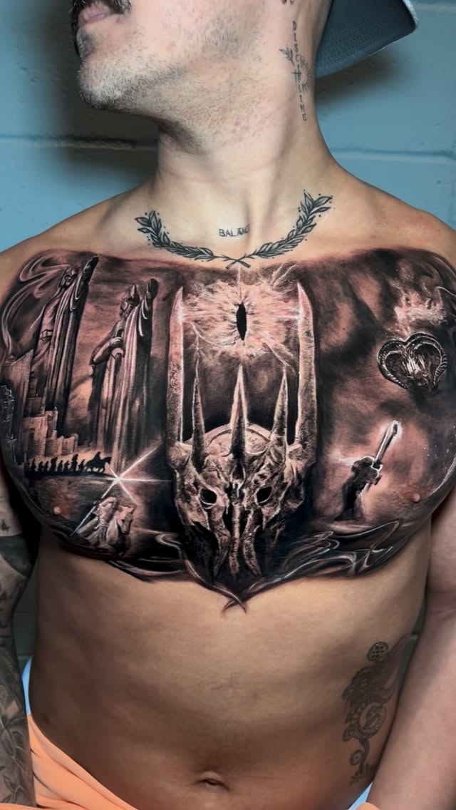 Epic black-and-gray LOTR chest piece with menacing helm