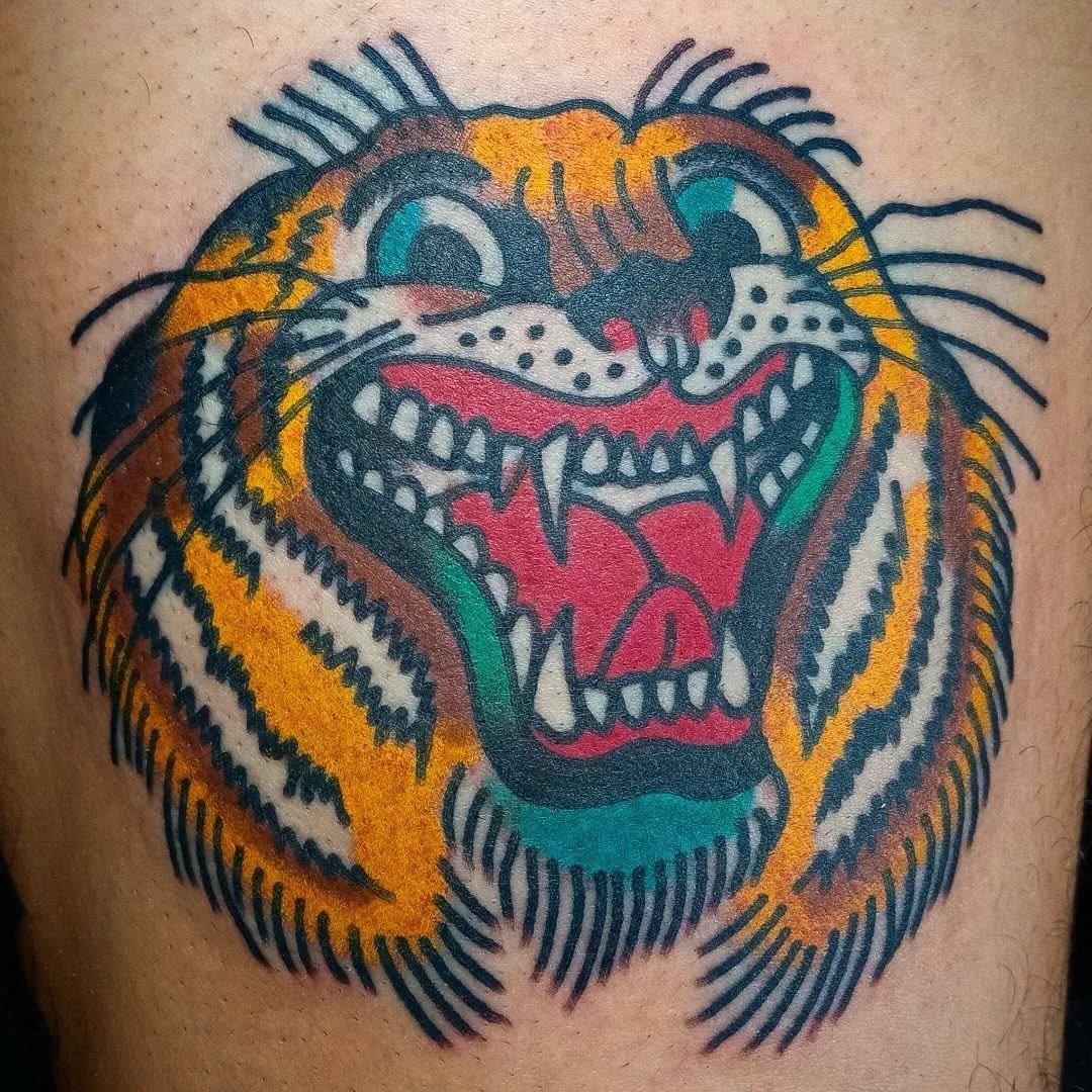 Vibrant tiger head in bold American traditional