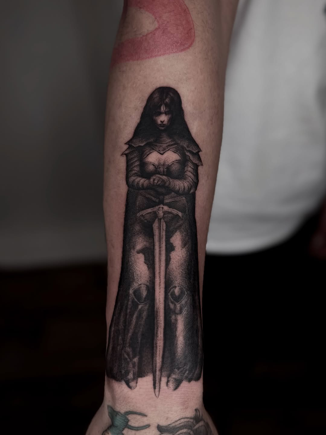 Dark vampiric queen in hooded cloak wielding sword