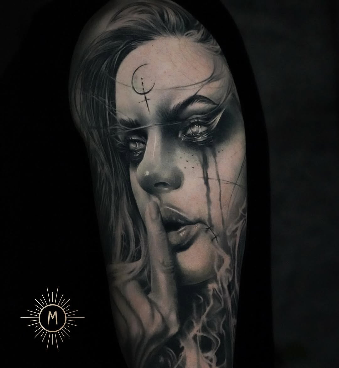 Hyper-detailed grayscale portrait with crescent forehead symbol and tear-streaks.