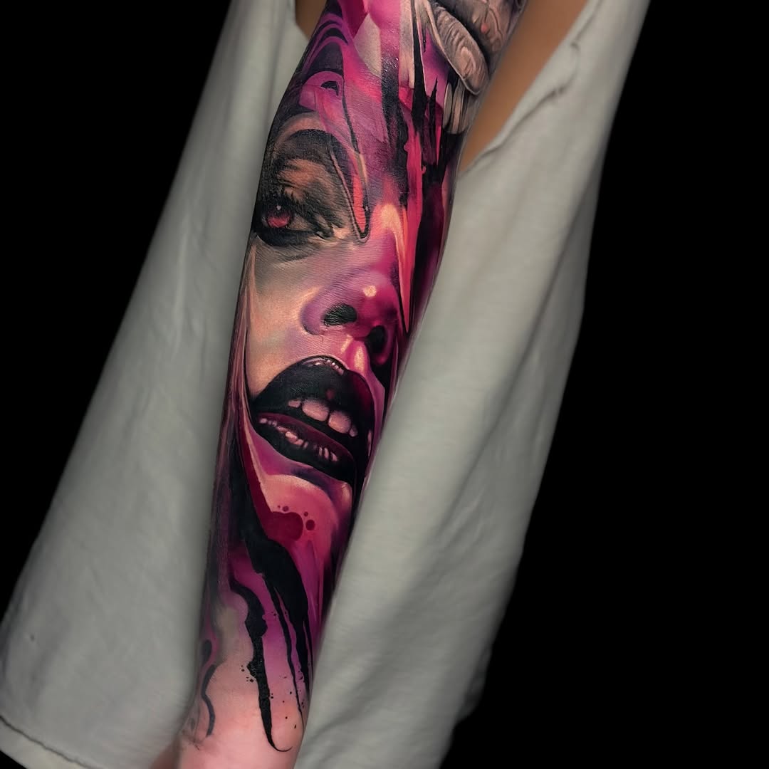 Vivid neon-pink portrait with dramatic ink drips