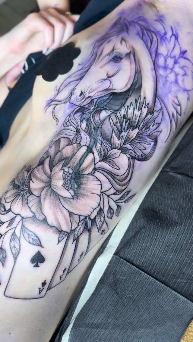 Delicate floral scroll with a graceful horse on ribs.