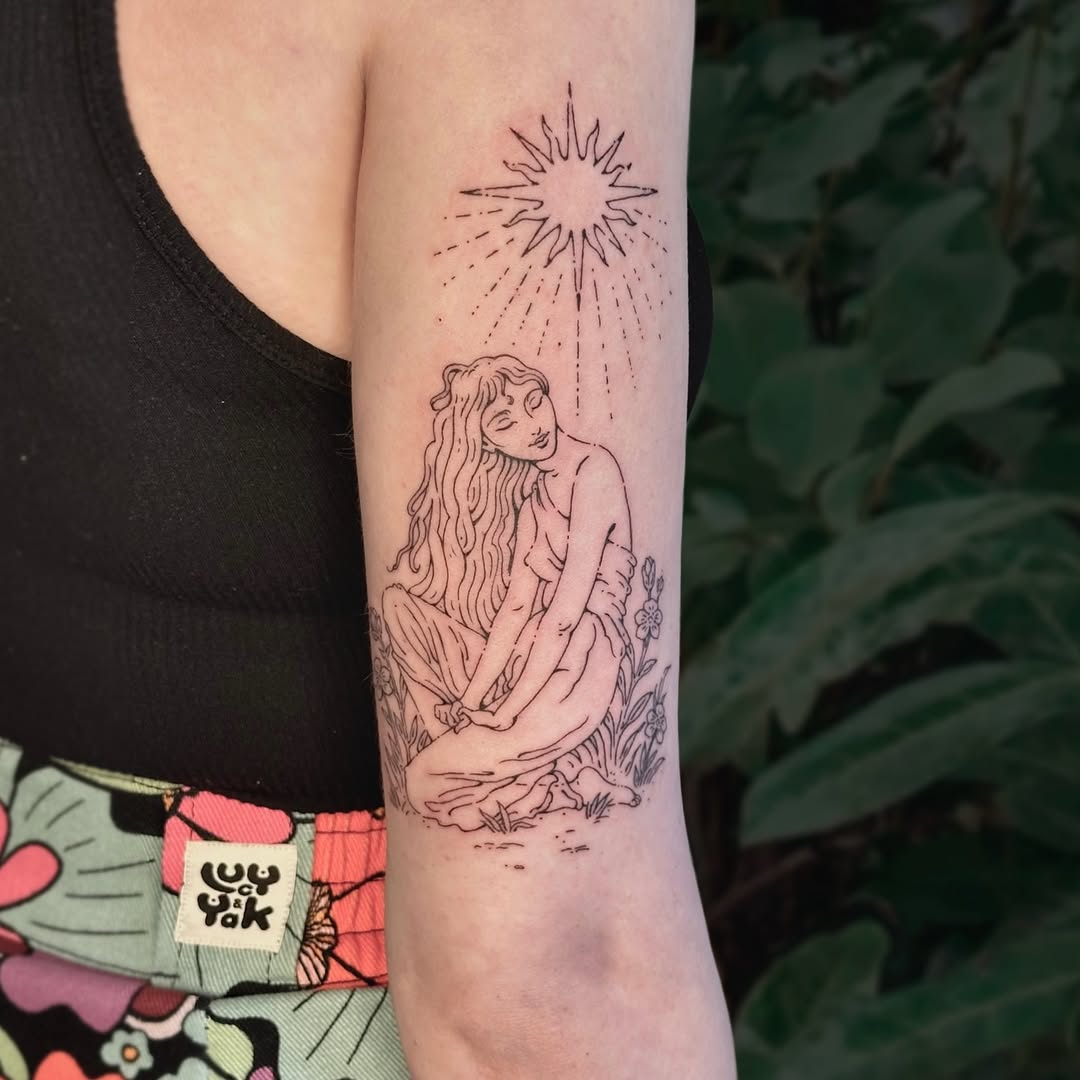 Delicate line-drawn woman seated among wildflowers under a sunburst