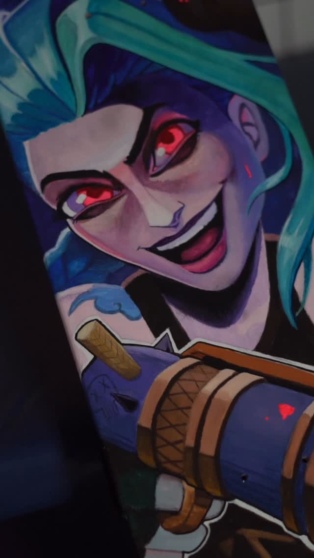 Vibrant cartoon portrait with blue hair on forearm